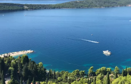 Kasjuni beach view of Ciovo island and blue sea and sky.